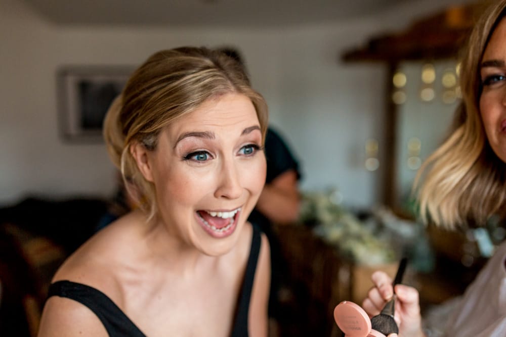 Bride laughing during bridal prep
