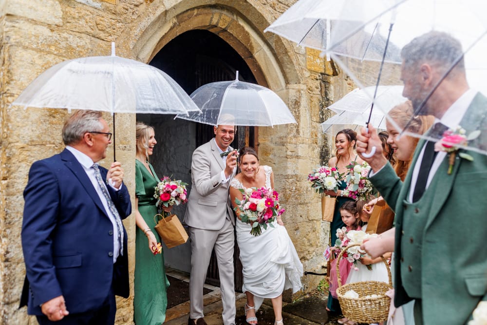 bride and groom leaving ceremony