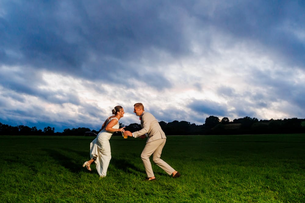 bride and groom having fun