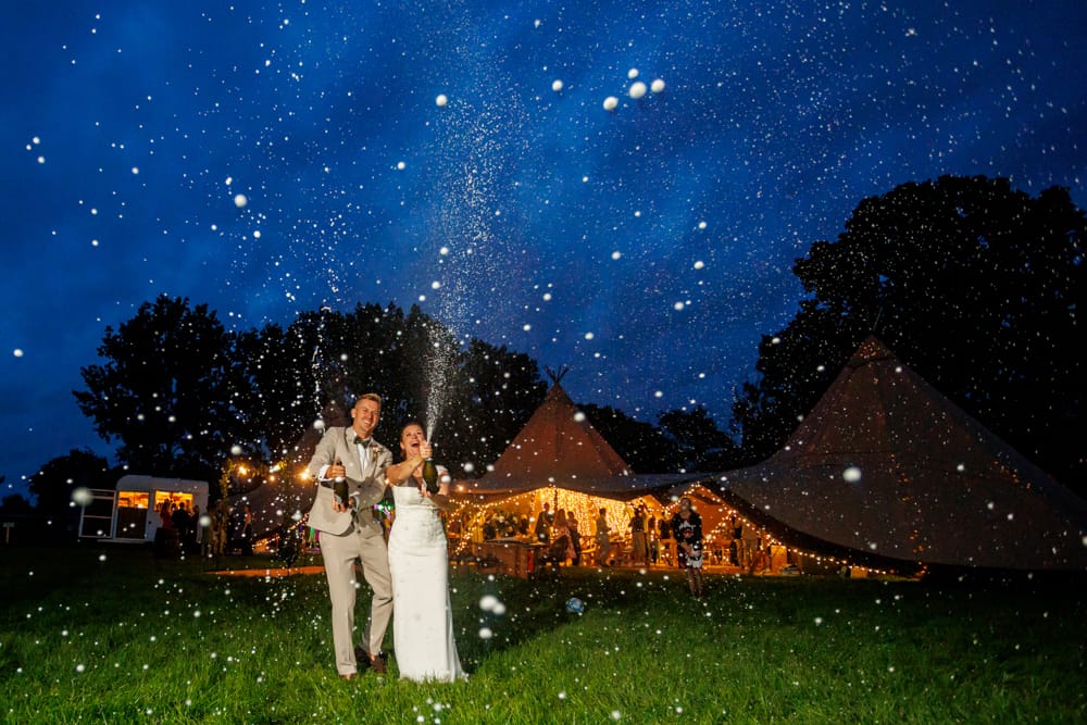 bride and groom under the stars