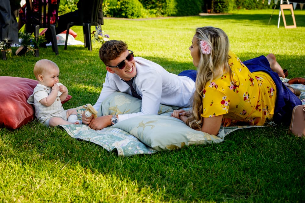 family relaxing in the sun