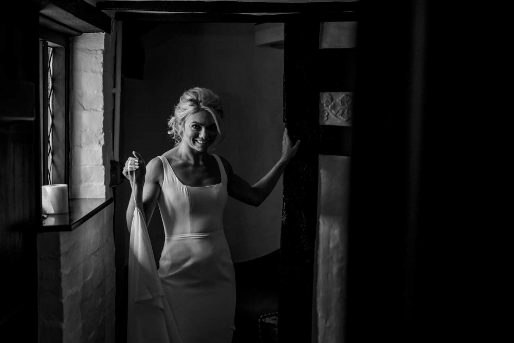bride entering the room in her wedding dress