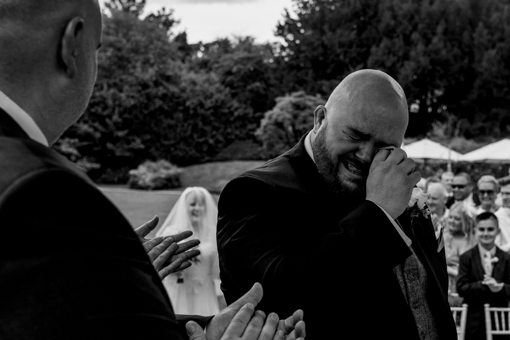 groom shedding a tear