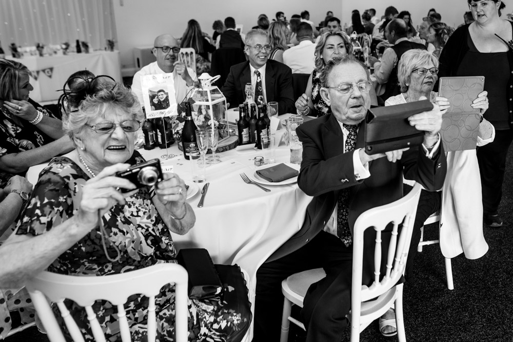 guests laughing during drinks reception 