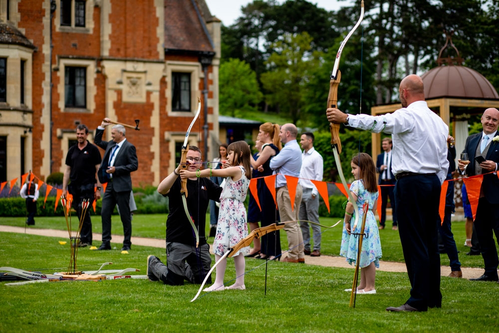 guests playing with the archery kit