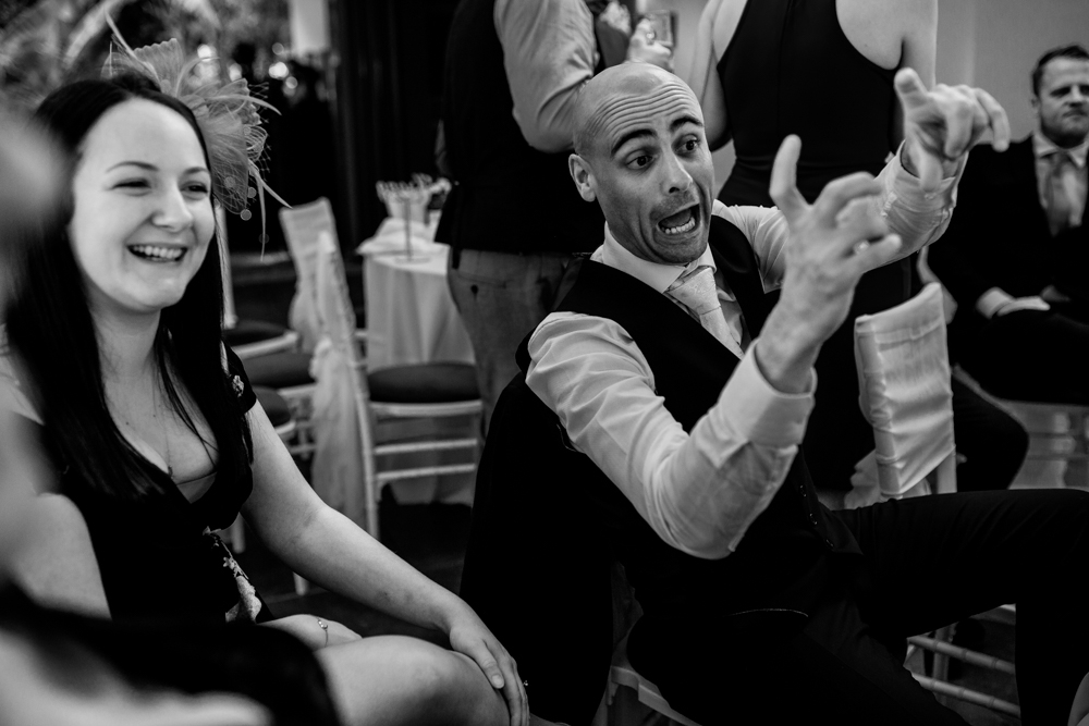 wedding guests having fun and laughing 