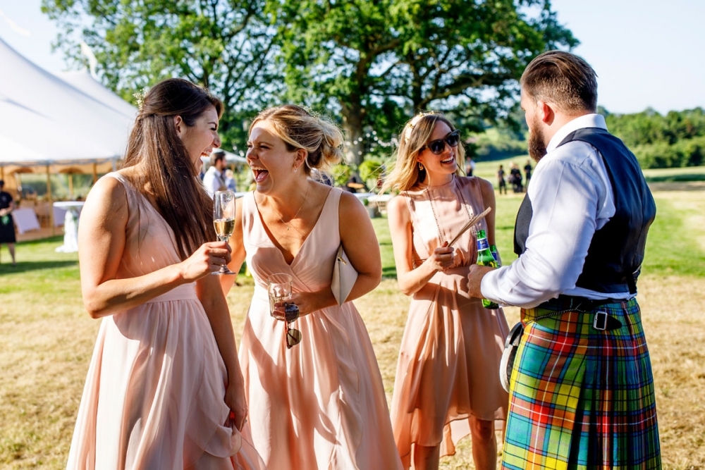 wedding guests laughing