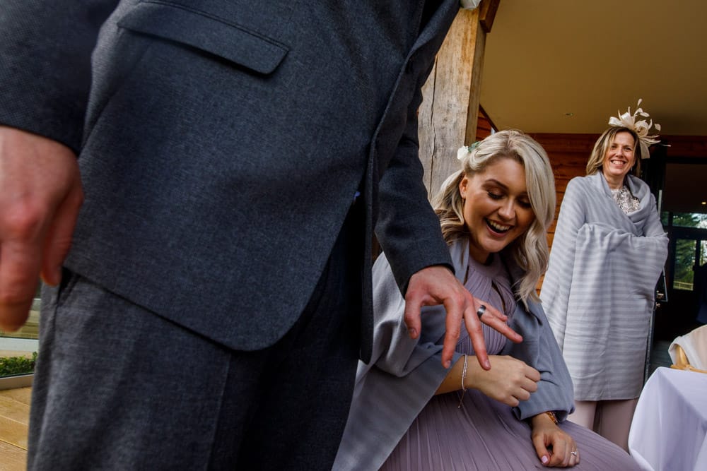 groom showing off his ring