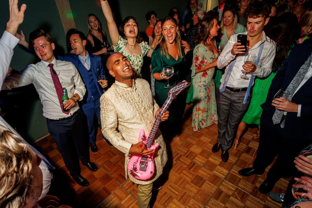 groom having fun with guests