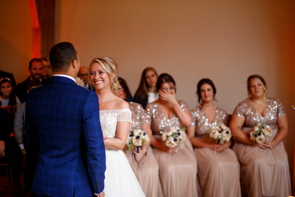 emotional bridesmaides during the ceremony