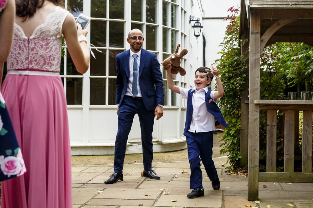 friends laughing during wedding breakfast